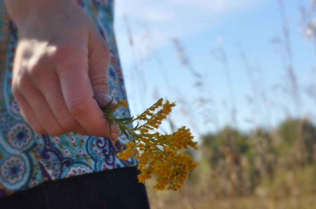 Woman walking with flower 