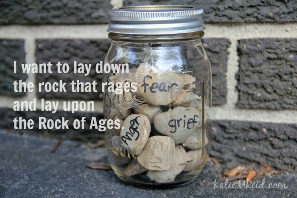 Lay down the rock that rages and lay upon the Rock of Ages by Katie M Reid