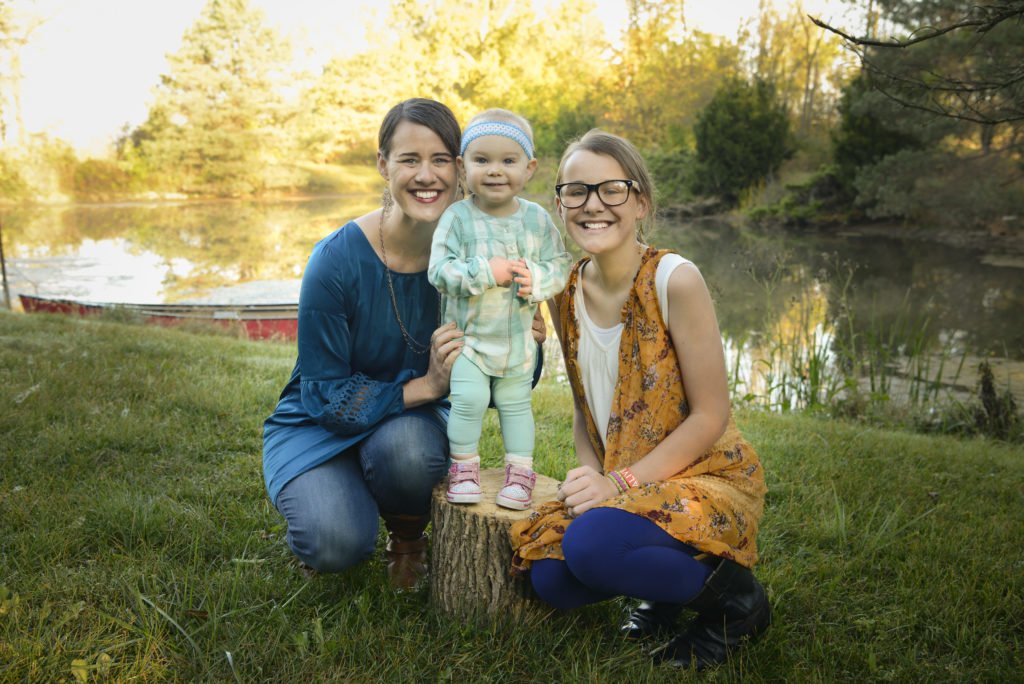 Mother and daughters in front of pond by Charis Seed Media Photography 
